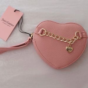 Juicy Coutoure heart-shaped wristlet in color pink.
